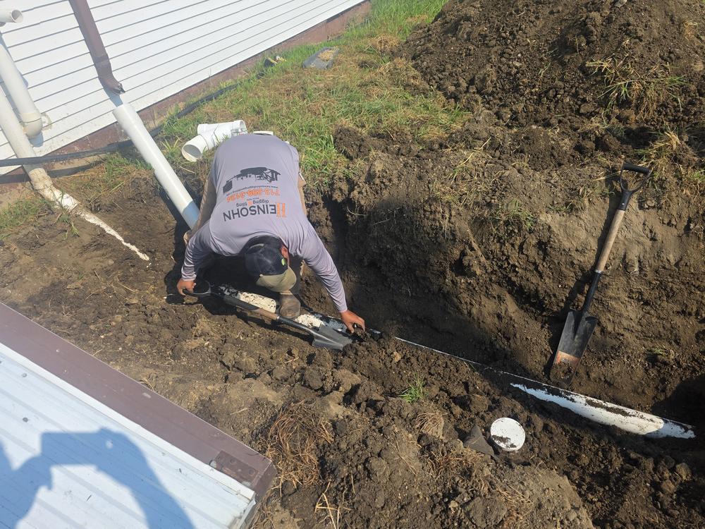 Excavated trench for a septic drain field near Storm Lake, Iowa