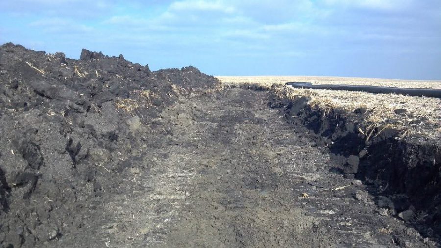 Excavated trench for a septic drain field near Storm Lake, Iowa